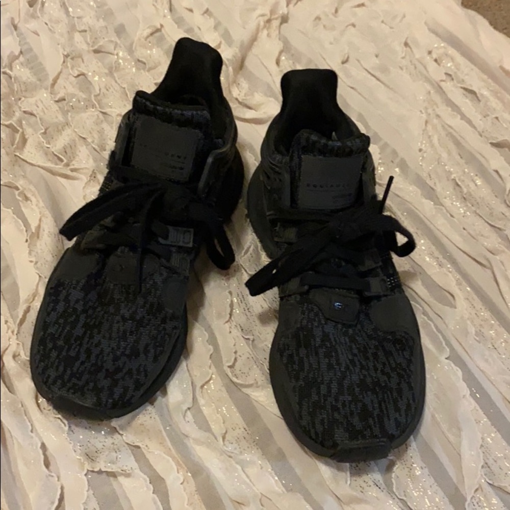 Black adidas EQT sneakers